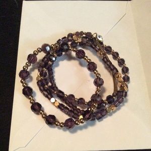 Set of 4 purple and gold stretch bracelets